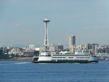Washington State Ferry and Space Needle, as seen from Alki Trail.